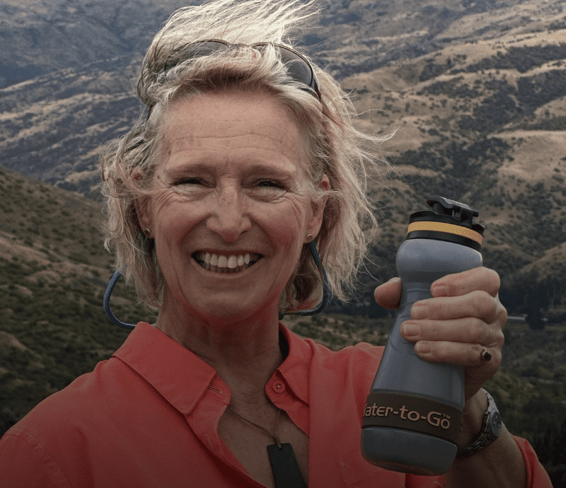 woman holding Water to Go bioplastic water filter bottle