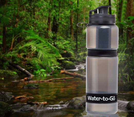 Water to Go Active water bottle with filter for travel with forest background